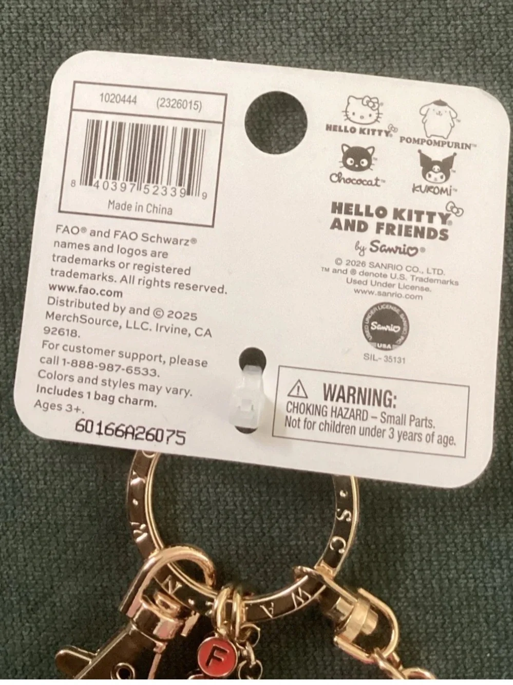 NWT FAO Schwarz Hello Kitty Pink and White Bag Charm Keychain
